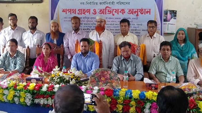 বালিয়াকান্দিতে মাধ্যমিক শিক্ষক-কর্মচারী সমিতির নির্বাচিত পরিষদের শপথ গ্রহণ